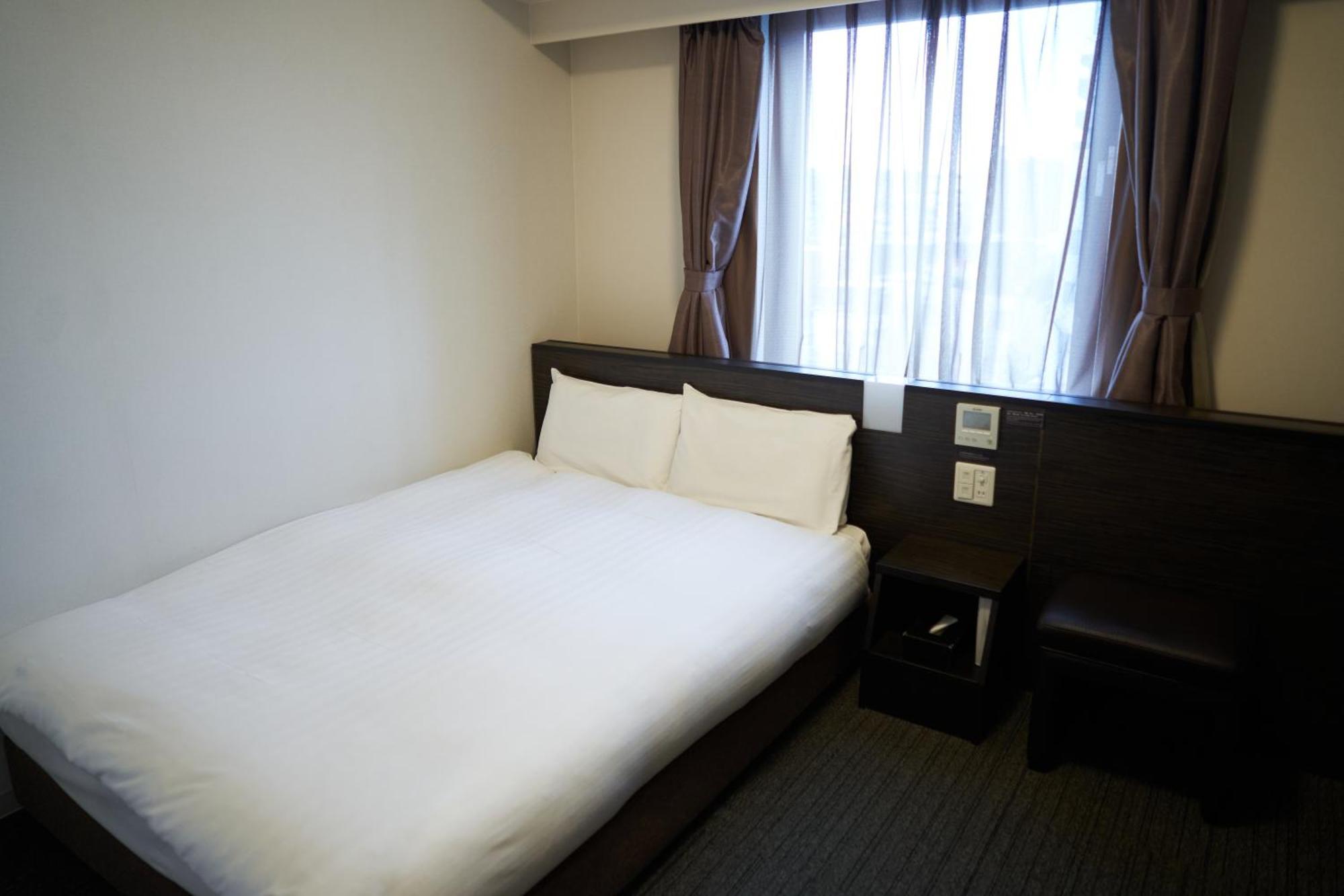 Dormy Inn Higashi Muroran Quarto foto